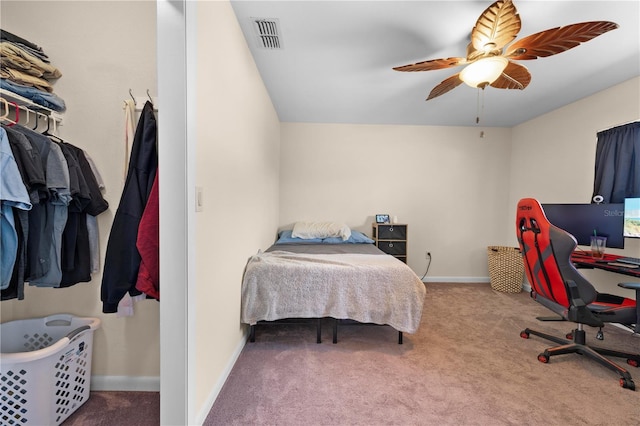 bedroom with visible vents, baseboards, a ceiling fan, and carpet flooring