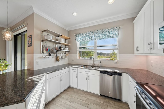 kitchen with crown molding, appliances with stainless steel finishes, open shelves, a sink, and white cabinets