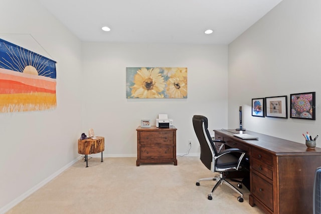 home office featuring baseboards, recessed lighting, and light carpet