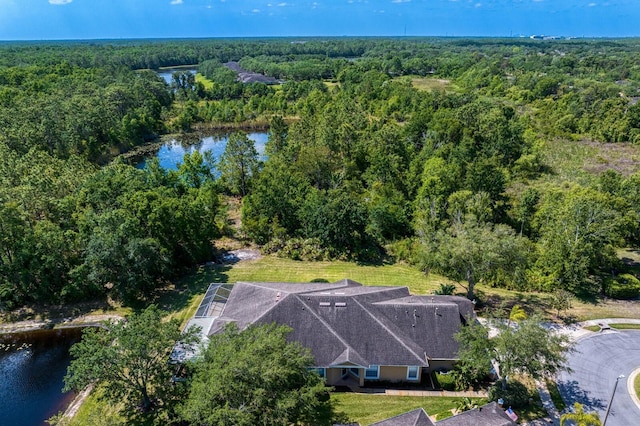 bird's eye view featuring a water view and a view of trees