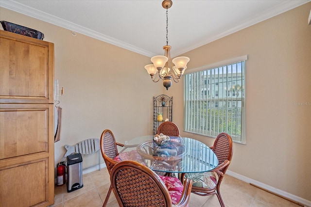 600 Gardens Edge Dr Unit 614, Venice, FL 34285 - dining area with a chandelier, ornamental molding, baseboards, and light tile patterned floors