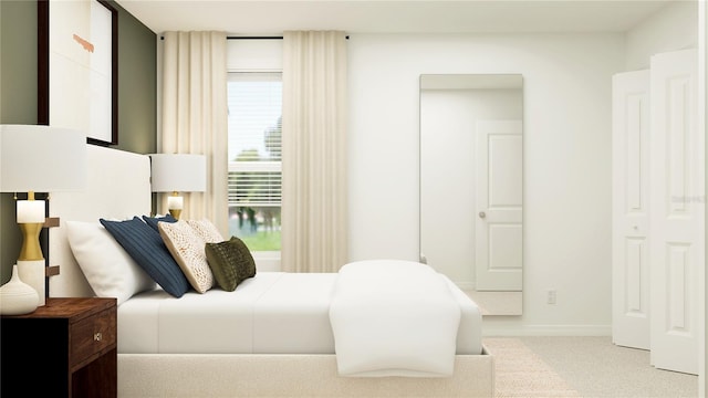 bedroom with baseboards and carpet