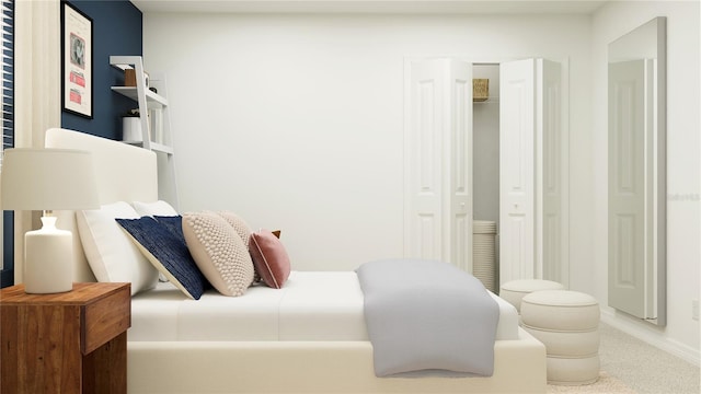 bedroom with a closet and baseboards