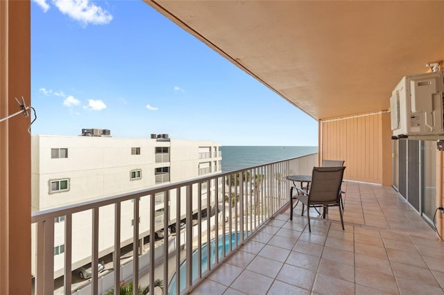 balcony featuring a water view
