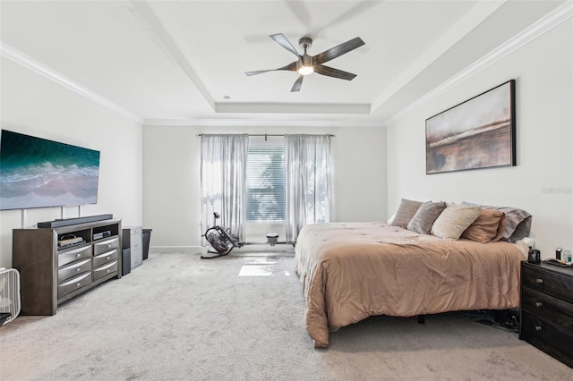 3952 Bonfire Dr, Odessa, FL 33556 - carpeted bedroom featuring crown molding, a raised ceiling, baseboards, and a ceiling fan