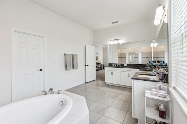 3952 Bonfire Dr, Odessa, FL 33556 - bathroom with vanity, tile patterned flooring, a bathtub, and visible vents