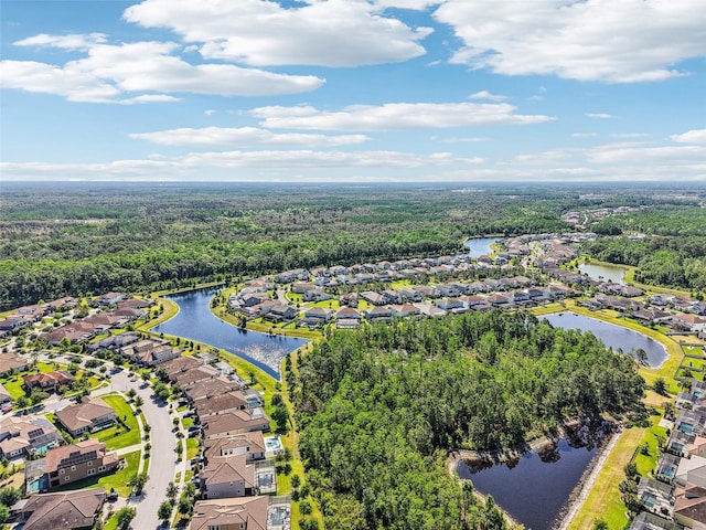 3952 Bonfire Dr, Odessa, FL 33556 - aerial view featuring a water view, a view of trees, and a residential view