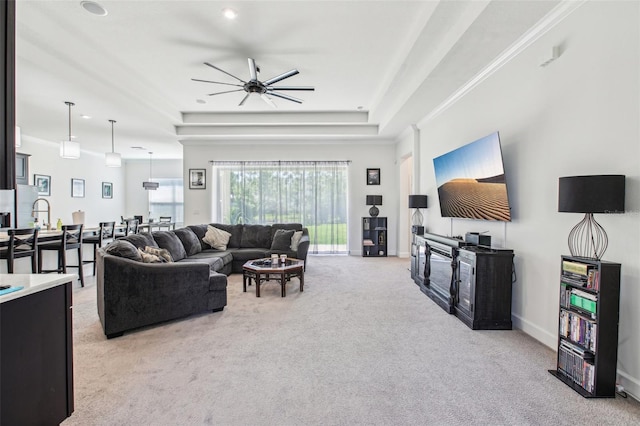 3952 Bonfire Dr, Odessa, FL 33556 - living room with baseboards, a raised ceiling, ceiling fan, light colored carpet, and recessed lighting
