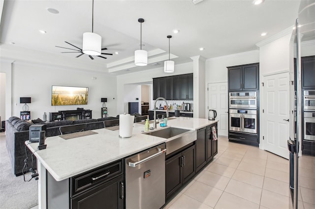 3952 Bonfire Dr, Odessa, FL 33556 - kitchen featuring ceiling fan, stainless steel appliances, open floor plan, and a sink