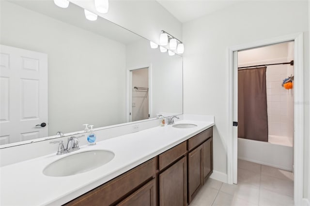 3952 Bonfire Dr, Odessa, FL 33556 - full bath with a sink, tile patterned flooring, shower / tub combo with curtain, and double vanity