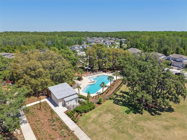 3952 Bonfire Dr, Odessa, FL 33556 - drone / aerial view featuring a view of trees