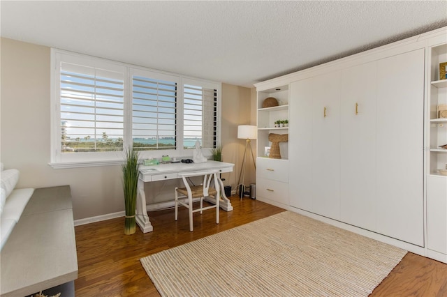1581 Gulf Blvd Unit 301N, Clearwater Beach, FL 33767 - office area with wood finished floors and a textured ceiling