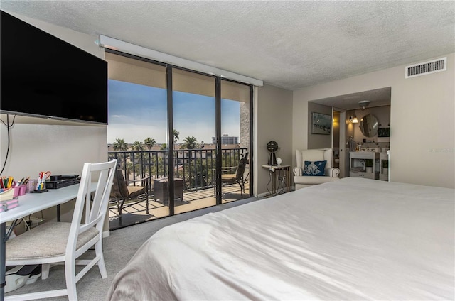 1581 Gulf Blvd Unit 301N, Clearwater Beach, FL 33767 - bedroom featuring a textured ceiling, floor to ceiling windows, access to outside, carpet flooring, and visible vents