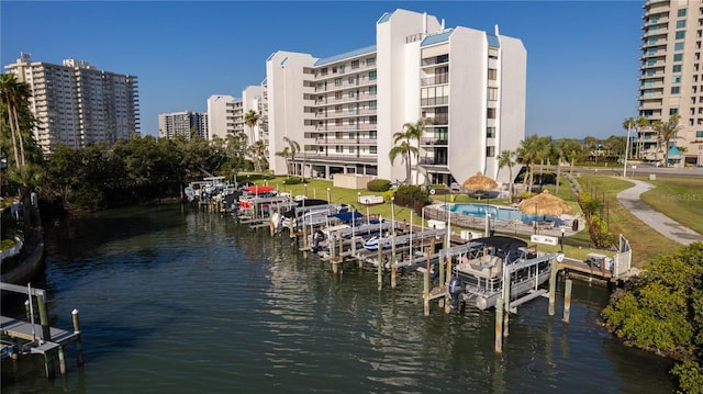 1581 Gulf Blvd Unit 301N, Clearwater Beach, FL 33767 - view of dock featuring boat lift and a water view