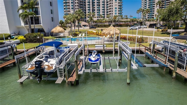 1581 Gulf Blvd Unit 301N, Clearwater Beach, FL 33767 - dock area featuring boat lift and a water view