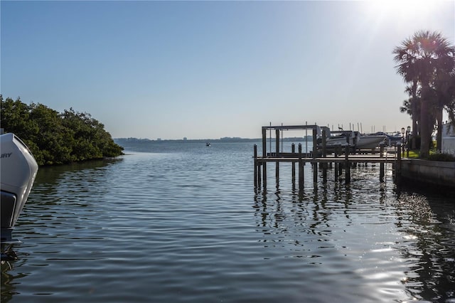 1581 Gulf Blvd Unit 301N, Clearwater Beach, FL 33767 - dock area with boat lift and a water view