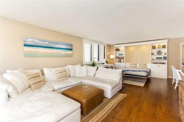 1581 Gulf Blvd Unit 301N, Clearwater Beach, FL 33767 - living room featuring dark wood-style floors and a textured ceiling