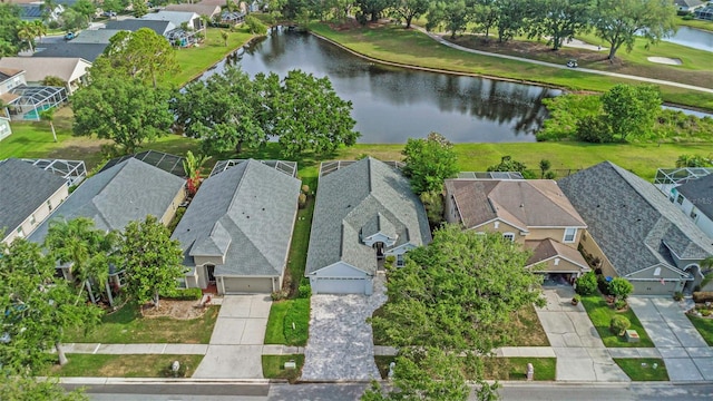 aerial view featuring a water view and a residential view