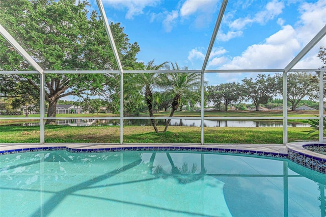 pool featuring a water view and a lanai