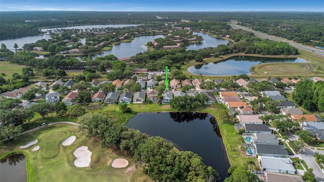 aerial view with a residential view and a water view