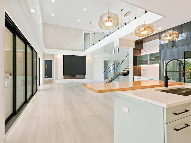 interior space with stairs and a sink