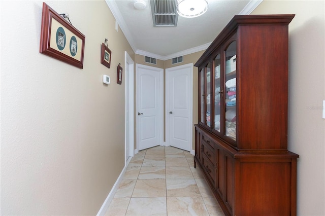 11210 Wheeling Dr, Tampa, FL 33625 - hallway featuring light marble finish floors, ornamental molding, and baseboards