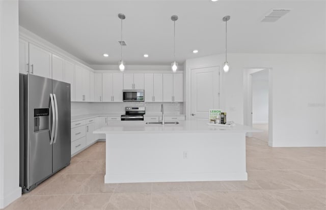 17200 Luminous Ave, Venice, FL 34293 - kitchen with appliances with stainless steel finishes, a sink, light countertops, white cabinets, and recessed lighting