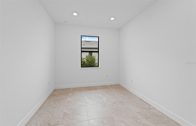 17200 Luminous Ave, Venice, FL 34293 - unfurnished room featuring baseboards and recessed lighting