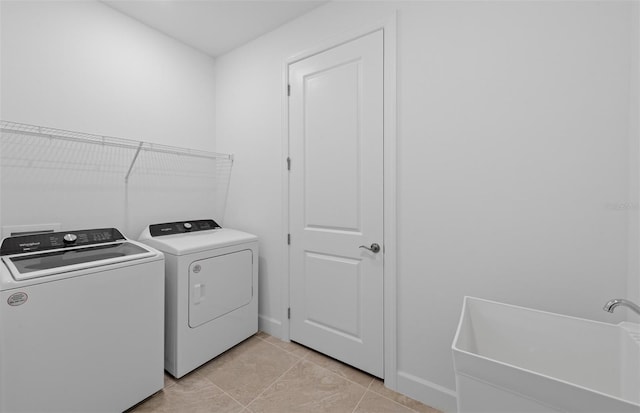 17200 Luminous Ave, Venice, FL 34293 - laundry room featuring separate washer and dryer and baseboards