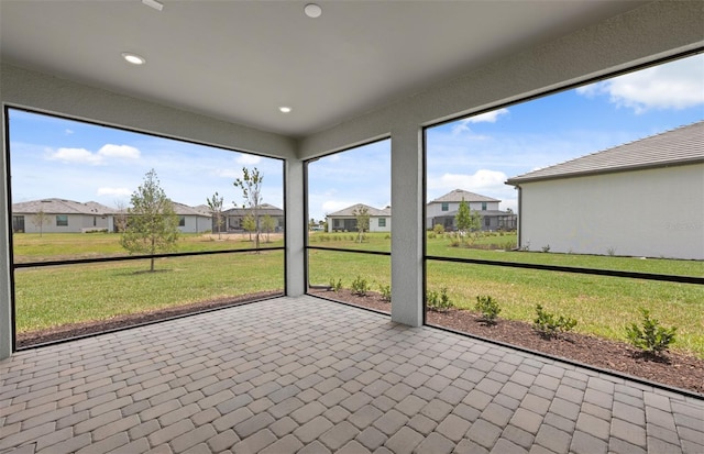 17200 Luminous Ave, Venice, FL 34293 - unfurnished sunroom featuring a residential view
