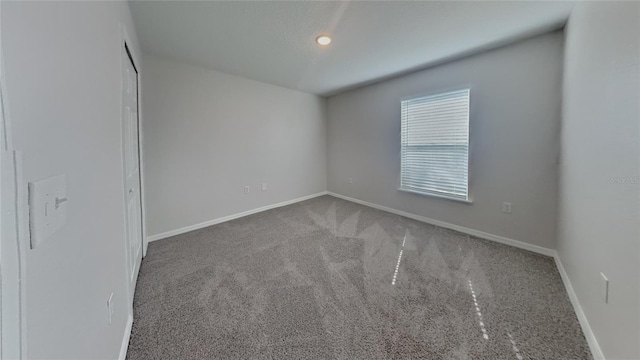 105 Evergreen Dr, Auburndale, FL 33823 - carpeted spare room with baseboards
