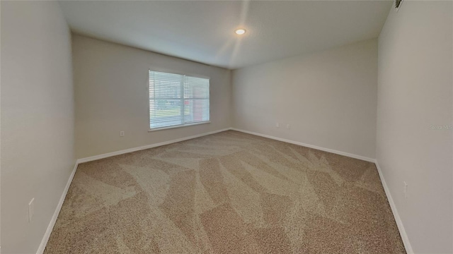 105 Evergreen Dr, Auburndale, FL 33823 - carpeted empty room with baseboards