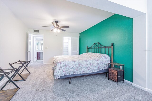 4137 Northmeadow Cir, Tampa, FL 33618 - carpeted bedroom with ceiling fan, baseboards, and visible vents