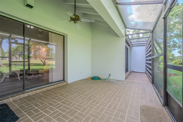 4137 Northmeadow Cir, Tampa, FL 33618 - unfurnished sunroom with a ceiling fan