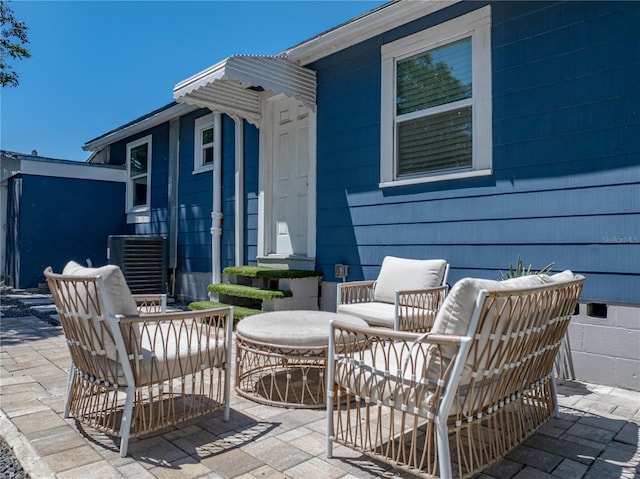 view of patio featuring central AC unit and an outdoor hangout area