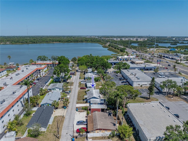 drone / aerial view with a water view