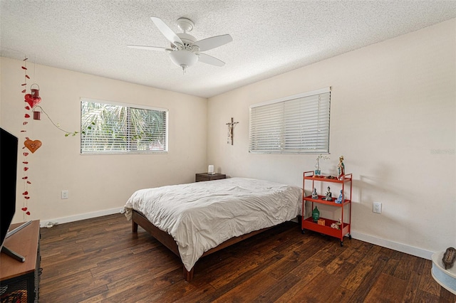 5636 Baywater Dr Unit 5636, Tampa, FL 33615 - bedroom featuring a textured ceiling, wood finished floors, a ceiling fan, and baseboards