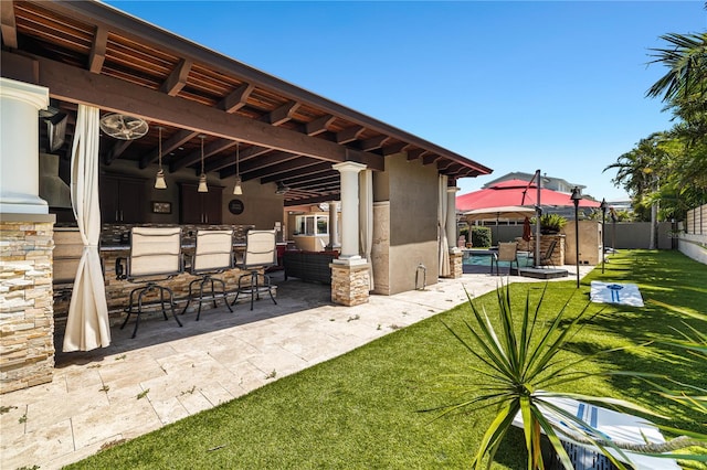 6129 Leeland St S, Saint Petersburg, FL 33715 - view of patio with a gazebo, outdoor dry bar, a fenced in pool, and a fenced backyard