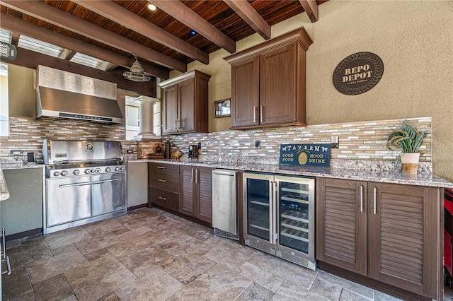 6129 Leeland St S, Saint Petersburg, FL 33715 - kitchen with wood ceiling, wall chimney exhaust hood, beam ceiling, wine cooler, and ornate columns