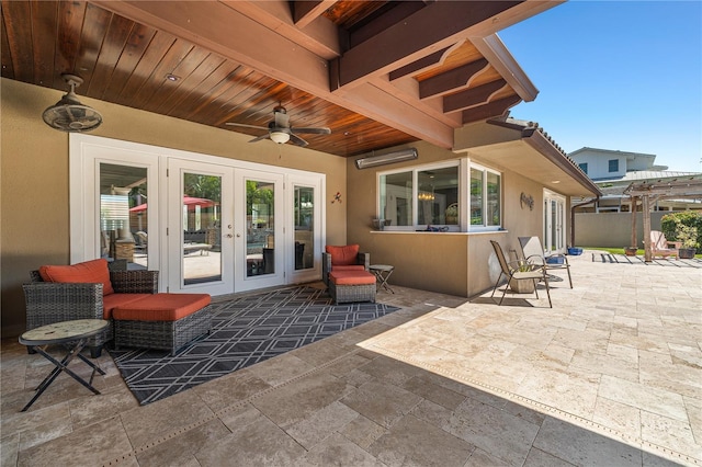 6129 Leeland St S, Saint Petersburg, FL 33715 - view of patio / terrace featuring fence, a ceiling fan, and french doors