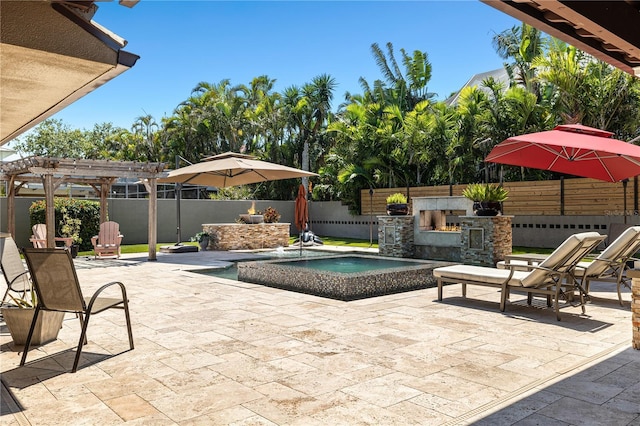 6129 Leeland St S, Saint Petersburg, FL 33715 - view of patio featuring a pergola, an outdoor stone fireplace, a fenced backyard, and a jacuzzi