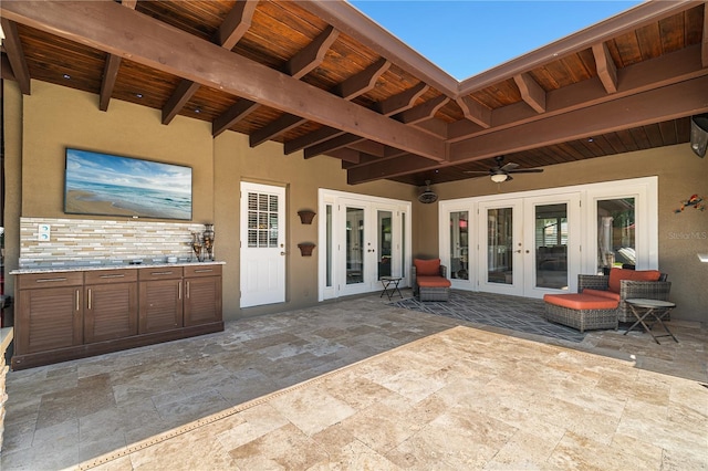 6129 Leeland St S, Saint Petersburg, FL 33715 - view of patio / terrace featuring a ceiling fan and french doors