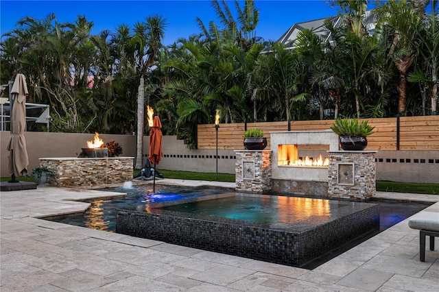 6129 Leeland St S, Saint Petersburg, FL 33715 - view of pool with a fenced in pool, a fenced backyard, a patio, and an outdoor fire pit