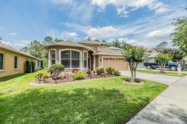 7815 Blue Spring Dr, Land O Lakes, FL 34637 - mediterranean / spanish-style home with stucco siding, an attached garage, driveway, and a front yard