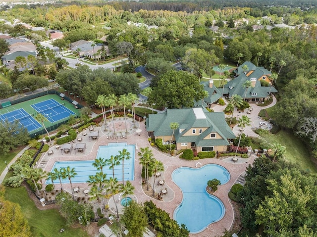 7815 Blue Spring Dr, Land O Lakes, FL 34637 - birds eye view of property featuring a residential view and a wooded view
