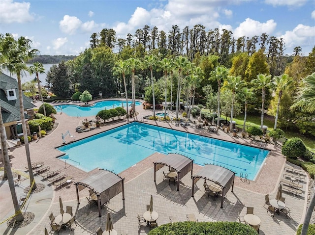 7815 Blue Spring Dr, Land O Lakes, FL 34637 - community pool with a patio area