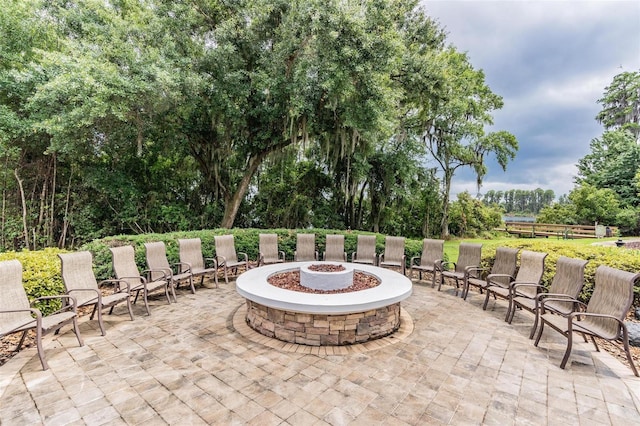 7815 Blue Spring Dr, Land O Lakes, FL 34637 - view of patio featuring a fire pit