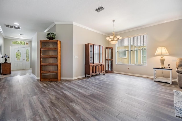 7815 Blue Spring Dr, Land O Lakes, FL 34637 - dining space featuring visible vents, crown molding, and an inviting chandelier
