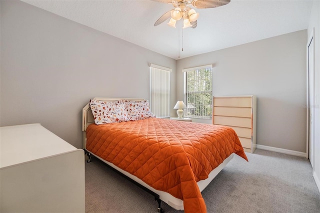 7815 Blue Spring Dr, Land O Lakes, FL 34637 - bedroom featuring a ceiling fan, baseboards, and carpet