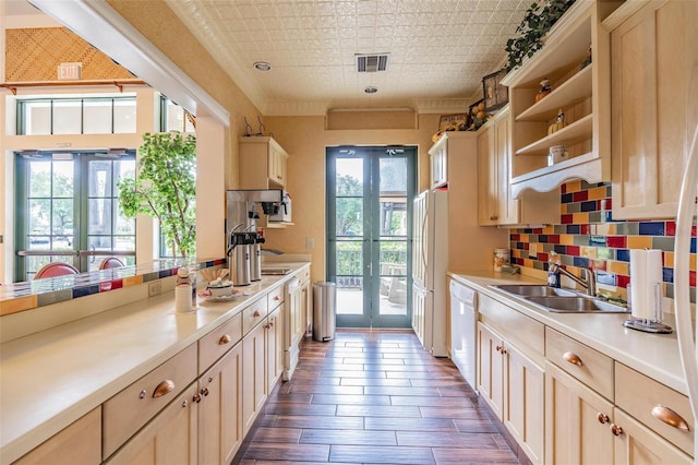 7815 Blue Spring Dr, Land O Lakes, FL 34637 - kitchen with open shelves, a sink, white appliances, french doors, and visible vents